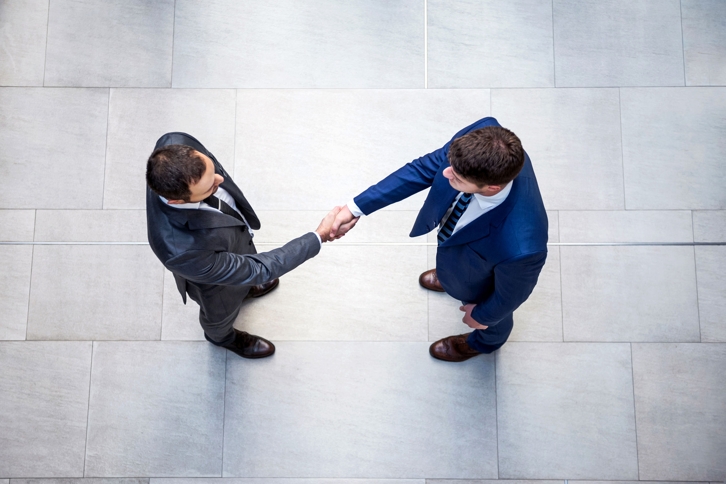 Business men shaking hands